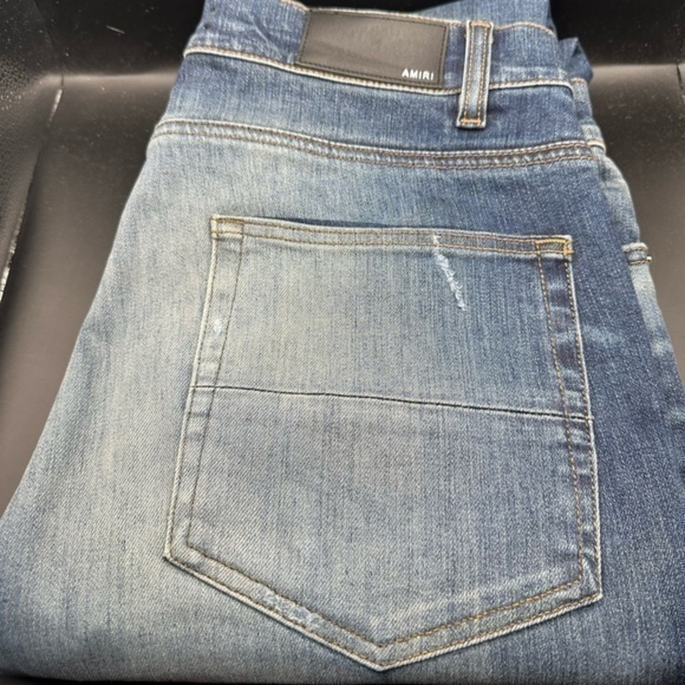 AMIRI Blue Sandblasted Blowout Skinny Jeans